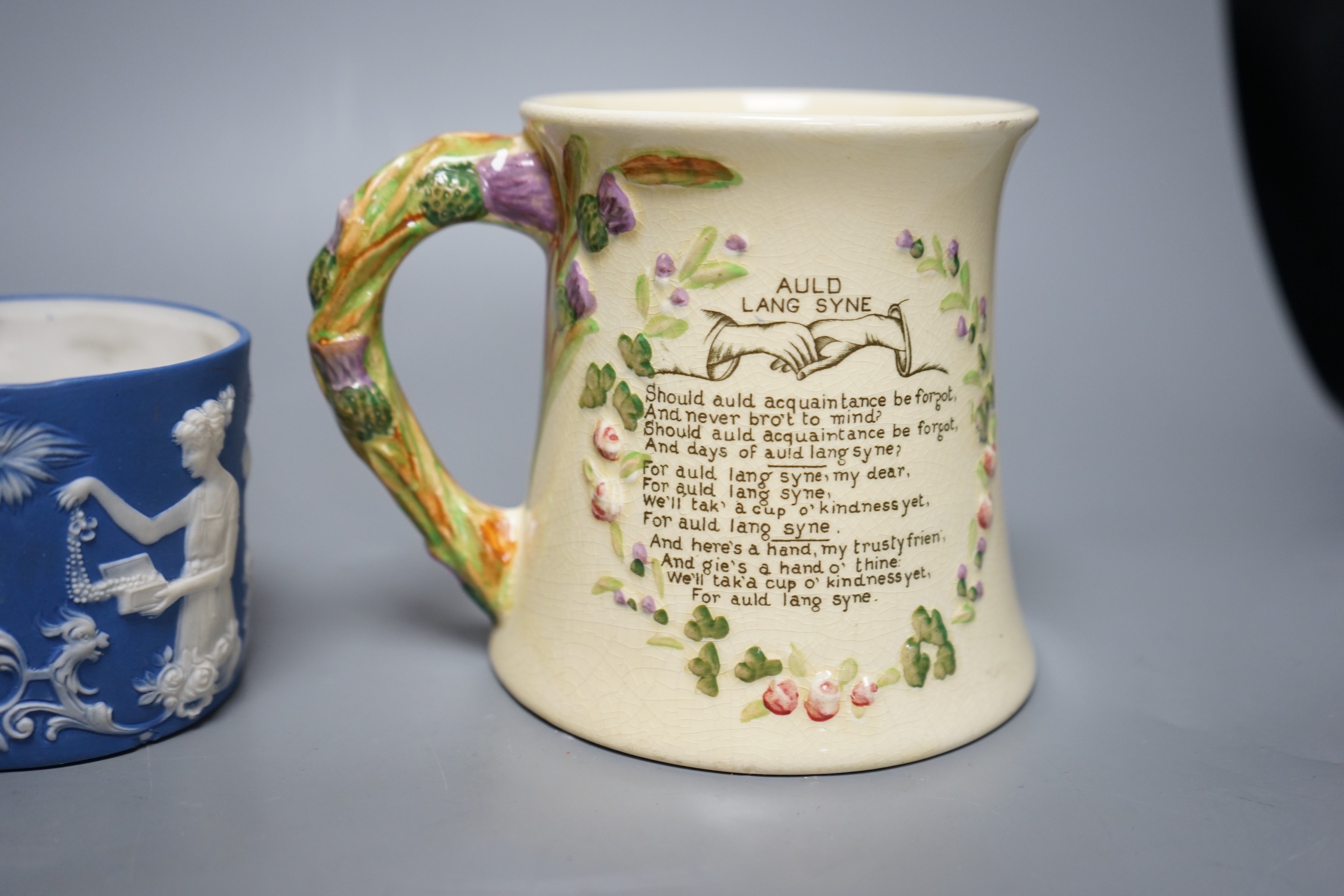 A Crown Devon Fieldings musical mug, a bronze tripod dish and a jasper pot